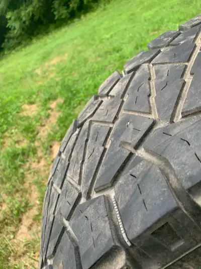 4 17 inch 5 bolt rims off jeep wrangler with 285/75r17 nitto ridge grappler tires. 75 percent tread...
