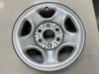 Brand new 16” GM steel wheel.