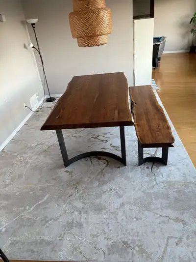 Condition is 99% New Dinning table 199*100*74H cm $2250 Bench 193*40*47H cm $1050 Hope to go with as...