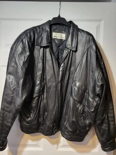 This is a classic Club International (Tip Top) brand black leather jacket, perfect for adding a touc...