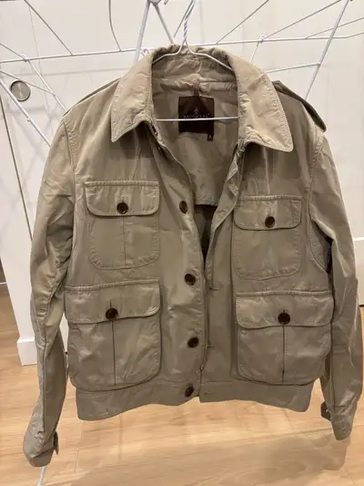 This is a stylish and versatile Moncler jacket, perfect for adding a touch of class to your wardrobe...