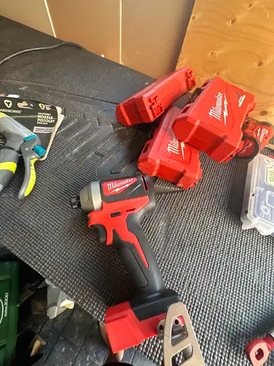 Milwaukee m18 impact driver like new $100, View more
