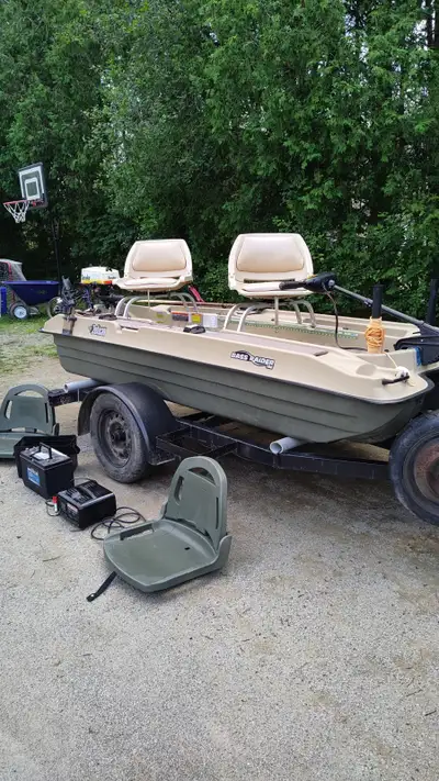 Bass Raider 10e boat, trailer, gas and electric motors for sale. Ready for the water. With anchor, r...