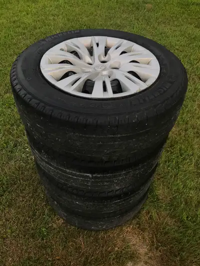 Michelin X Tour 205/65R16 tires on rims with Toyota hubs, will fit 2011-2016 Toyota Camry. The bolt...