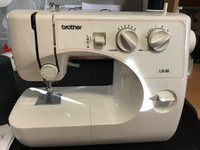SEWING MACHINE: BROTHER plus two HUGE spools of thread