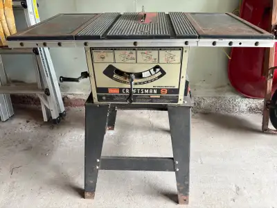 This is a used Craftsman table saw with four very sharp blades, perfect for any woodworking enthusia...