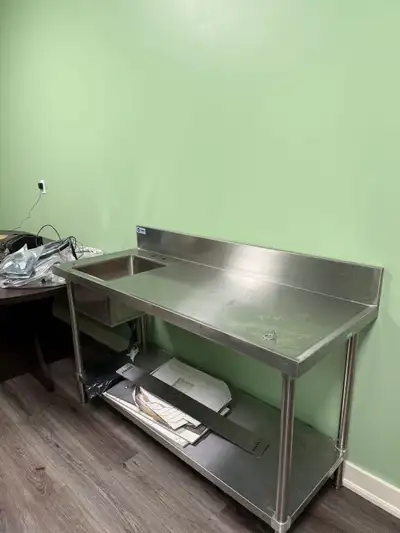 Stainless steel commercial work table with an integrated sink, View more