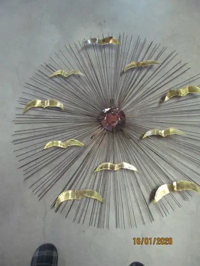 Birds in flight. Measures 38" in diameter.