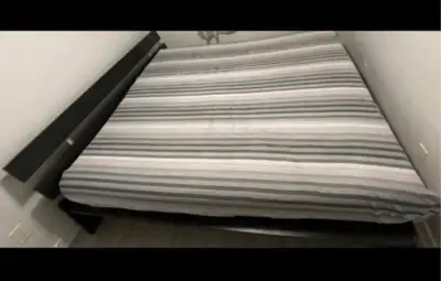 Offer King size bed frame with mattress in a matte finish wood, View more