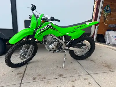 Selling my brand new Klx140r f, bike was paid in full 2 weeks ago was ridden once and not the bike f...