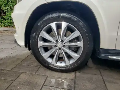 I have a set of original Mercedes wheels and tires of my GL (x166) but they will fit MLs and other M...