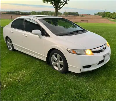 Used 2010 Honda Civic with 192725 kms. Power windows and mirrors. 2 key fobs. Set of summer and wint...