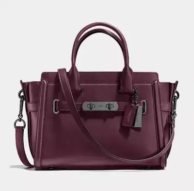 Authentic Coach Swagger 27 in Burgundy | New with original tags, View more