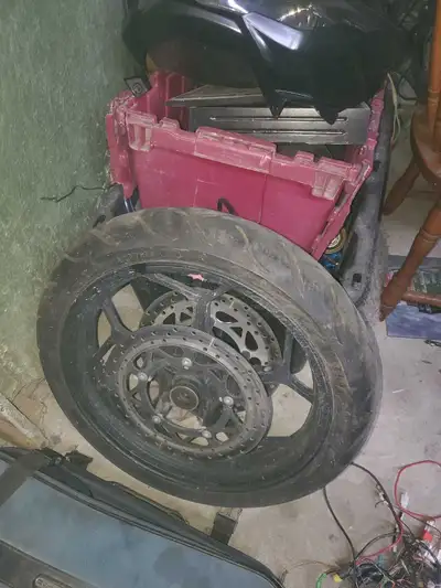 Emmons zone front wheel with tire and rotors, View more