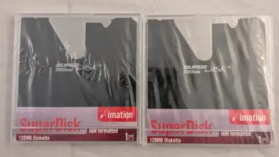 Never removed from package. Two SuperDisks. Pickup near Upper Middle and Guelph Line (Burlington). I...