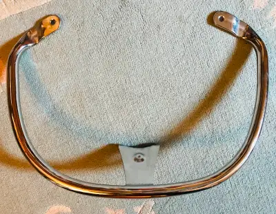 This is the chrome rail that your passenger grips. It does not have any scratches or dents. It is ea...