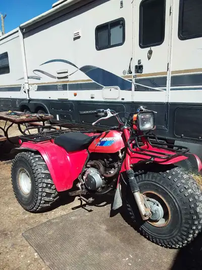 Absolutely Beautiful Honda ATC big red. Electric start. 1982 trike all tires hold air. I'm sorry pos...