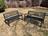 Two steel outdoor bench seats