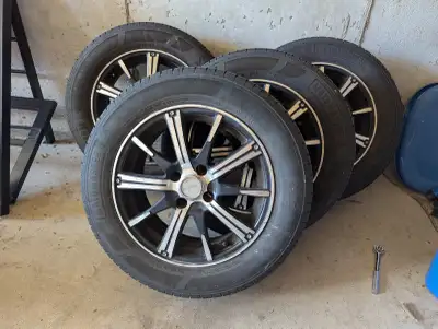 Set of 4 slightly used All Season tires with rims. Good condition. 4 bolt. Came from a 2014 KIA Rio.