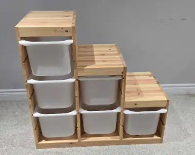 Selling a used IKEA TROFAST storage unit in the light white stained pine finish. It includes the sol...