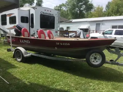 Excellent Condition, New Boat Cover comes with Old style life jackets, Oars, Fish Finder, Live Well,...