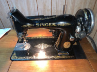 Vintage Singer 99 Sewing Machine in Cabinet for $90