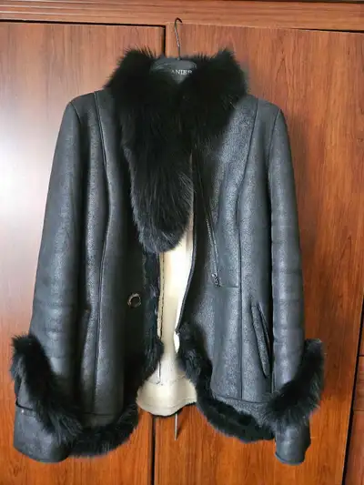 Black shearling jacket with fur trim, View more