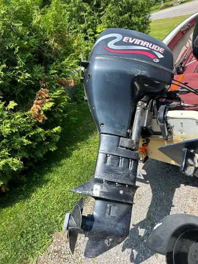 9.9 Evenrude motor with remote controls 4 stroke works great. 1800.or best offer