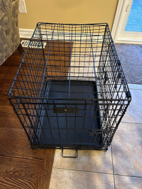 small mesh wire dog cage with pan at the bottom