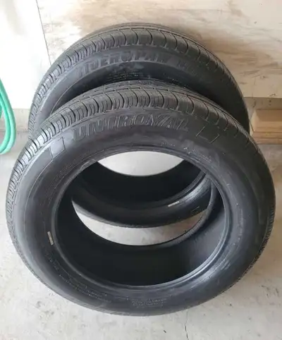 2 Uniroyal Tiger Paw Touring All Season Tires for Sale. **235/60/R18** Great Condition. (11/32") 95%...