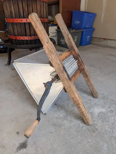 Fully working, clean, stored indoors and washed after every use. Grape press with hardwood blocks. A...