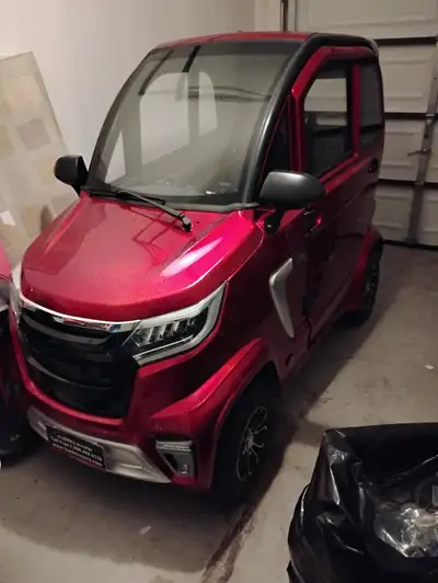 Enclosed mobility scooter for sale as is please contact me My name is Sean.