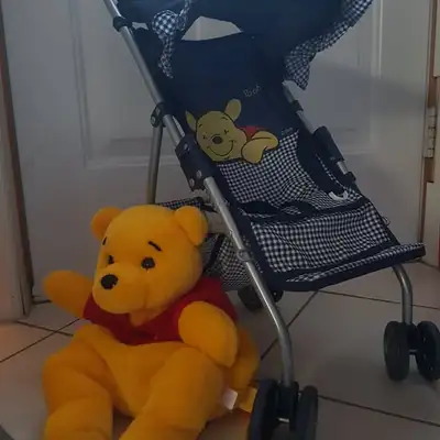 The set includes: - 1990's - 2' (foot) tall Disney's Winnie the Pooh children's play stroller - 1990...