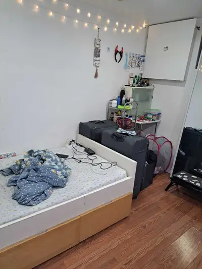 This cozy v drawers, a wardrobe for your clothes, and a small black table, perfect for students or a...