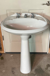 Pedestal sink with faucets. 24”W - 22”D - 32” T