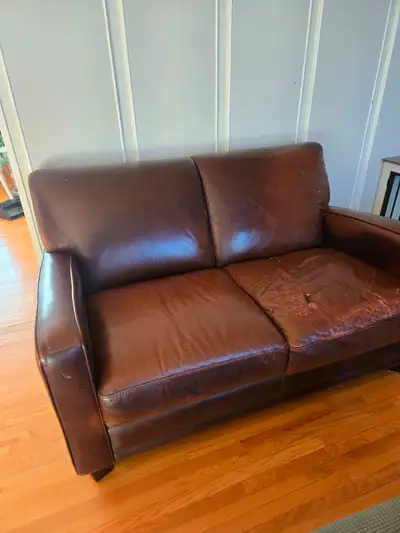 Leather couch and loveseat plus ottoman, View more