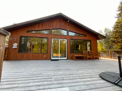 This lovely four bedroom, two bath home is located on a 1.065 acre riverfront lot just minutes from...