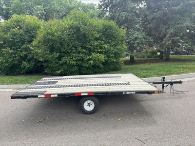Trailtech 8x12 tilt-deck ATV/snowmobile trailer in good condition. Full-width deck makes it great fo...