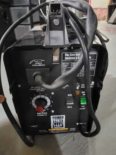 This is a Powerfist Flux Core Welder, a portable wire feed welding machine designed for projects tha...