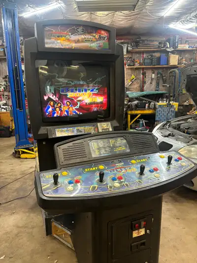 Title says it all. Awesome nfl blitz / nba showtime combo arcade cabinet. Game works great all four...