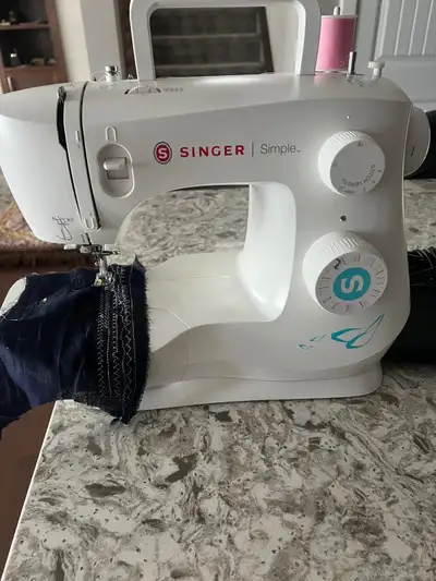 Selling singer sewing machine works great! Asking $175