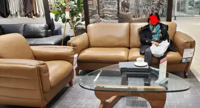 Genuine leather couch bought from Hudson's Bay for 3k on sale. Original price 5k. The item is in gre...
