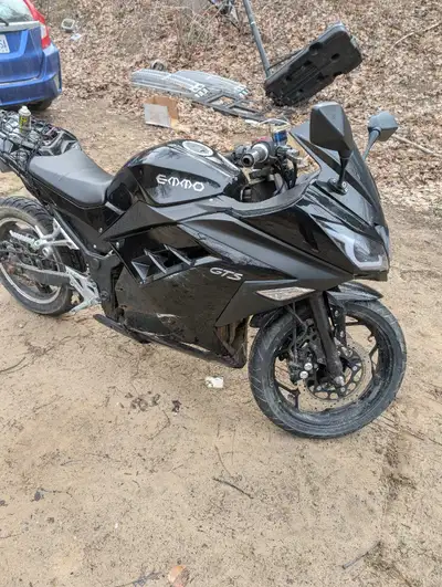 Selling a Gokko GTS motorcycle, this bike has some wear and tear from use, but it's still a fun ride...