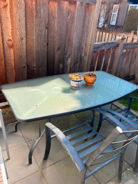 Balcony table with glass surface and iron frame only 5 dollars