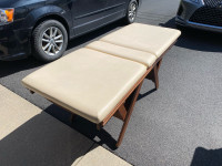 Foldable massage table made by solid wood. 