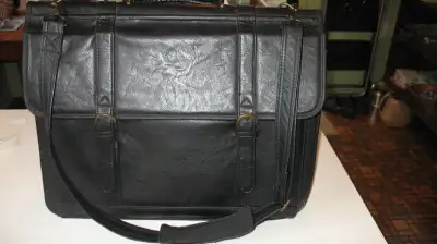 1. black leather with shoulder strap, 11 pockets, 18w 13h 7d Really nice $40 2. Burgundy soft leathe...