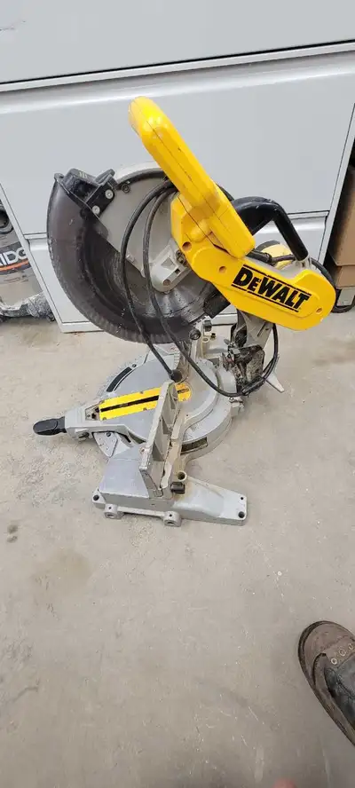Used Dewalt 12 inch miter saw. Works great; lots of power and cuts true. Just built a fancy composit...