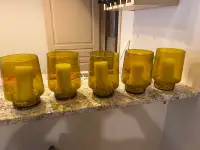 Five large decorative candle holders