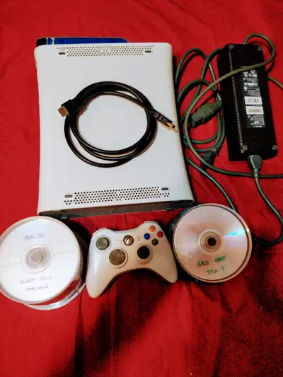 Selling an Xbox 360 with 60+ games same condition I got it. See picture for full list of games. One...