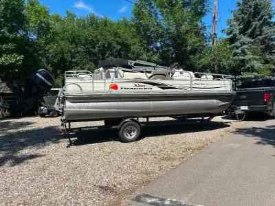 2 new marine batteries and winter tarp included